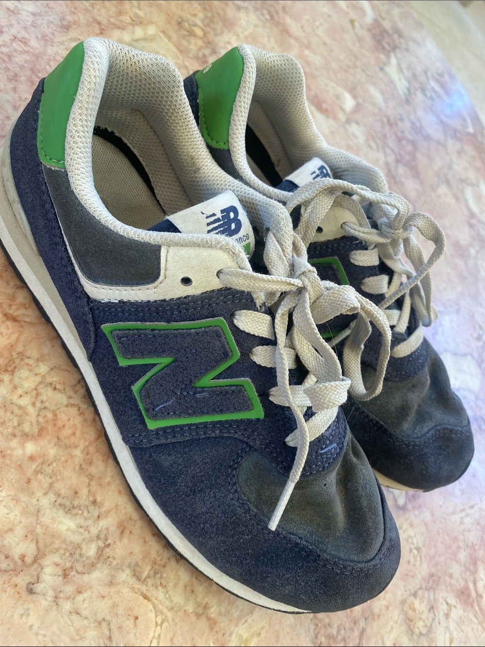 New Balance is 574 boy's  Navy and Green Suede Athletic Sneakers